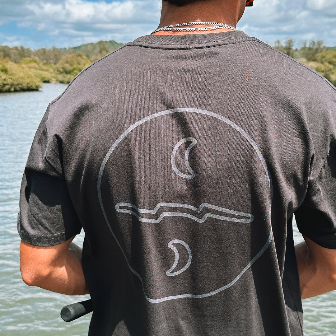 Charcoal relaxed fit t-shirt with contrasting Missing At Sea logo on chest and large circle logo on the back