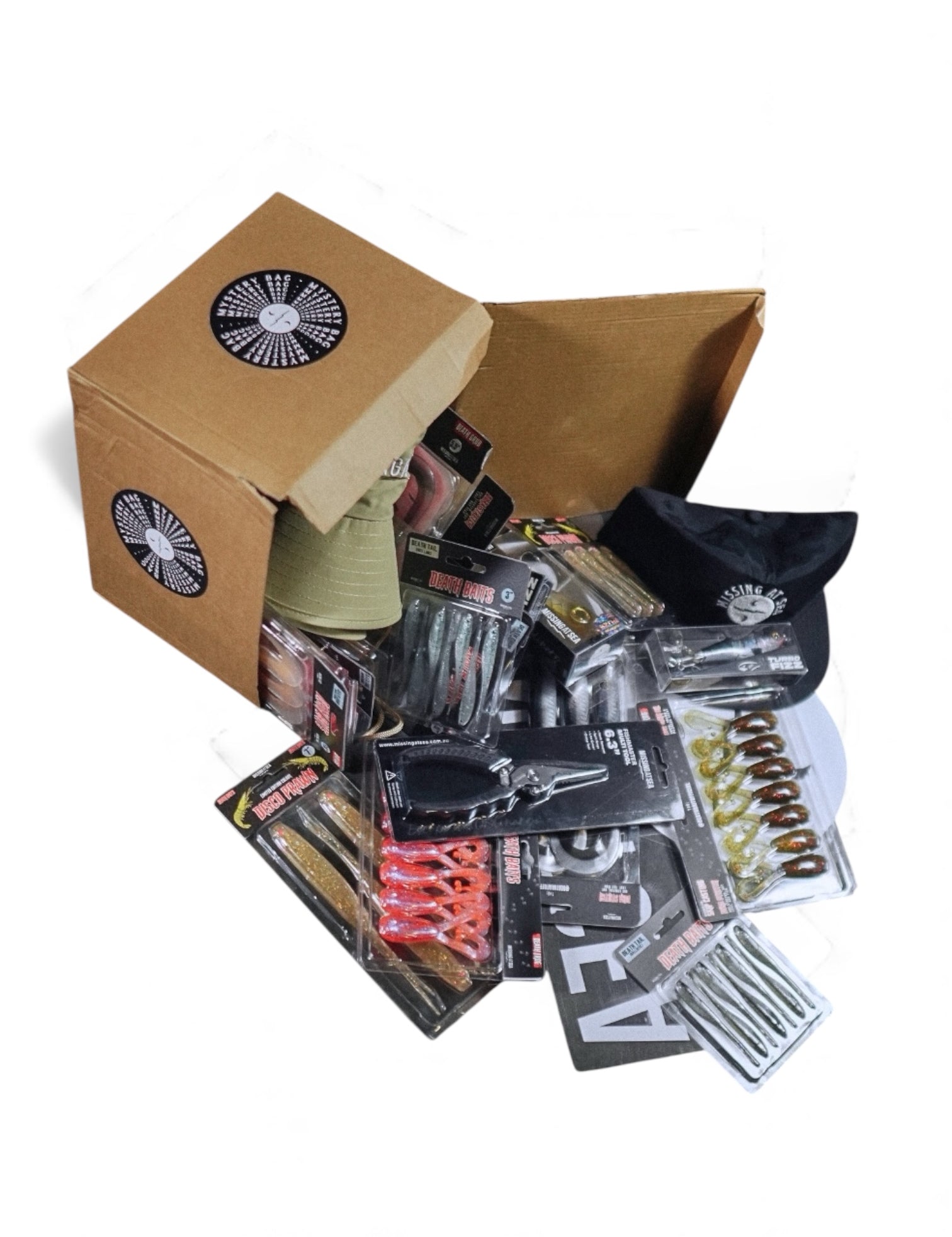 Open cardboard box with fishing lures and tackle on a white background